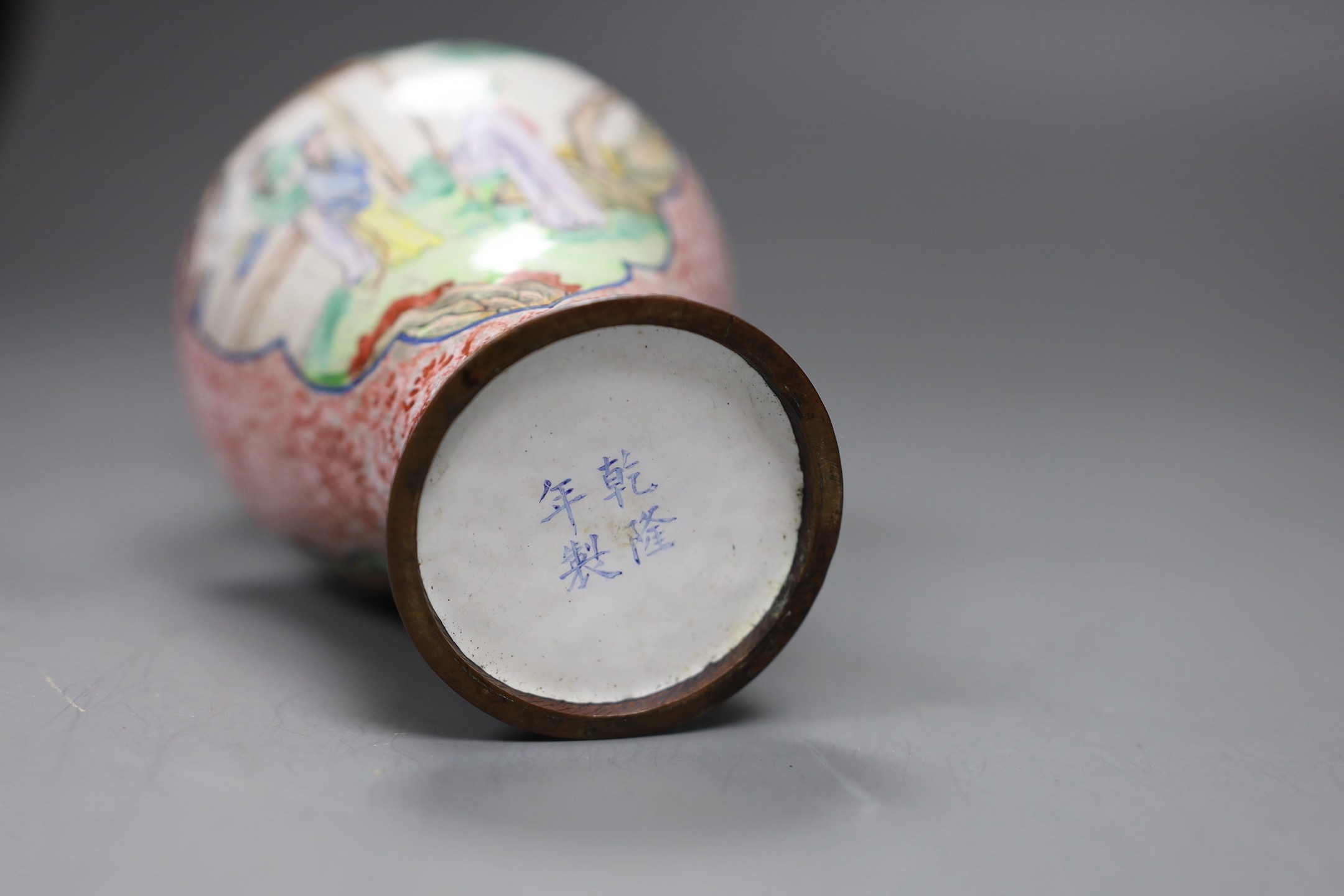 A Chinese Canton enamel vase, Qianlong mark, late 18th / 19th century, 16.5cm tall